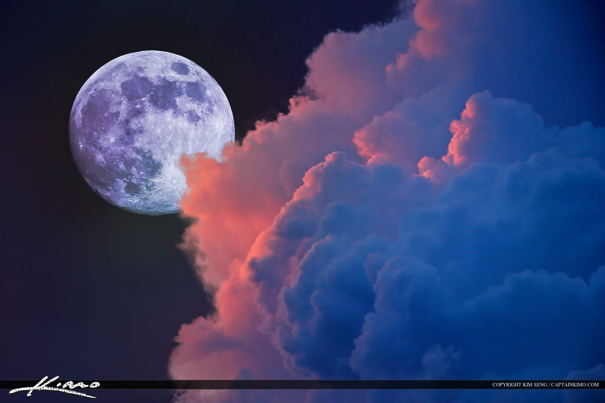 Lunar Moon Rise With Colorful Clouds In Sky Royal Stock Photo