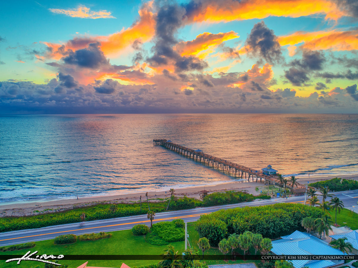 Juno Beach Pier Sunrise Storm at the Horizon Aerial Royal Stock Photo