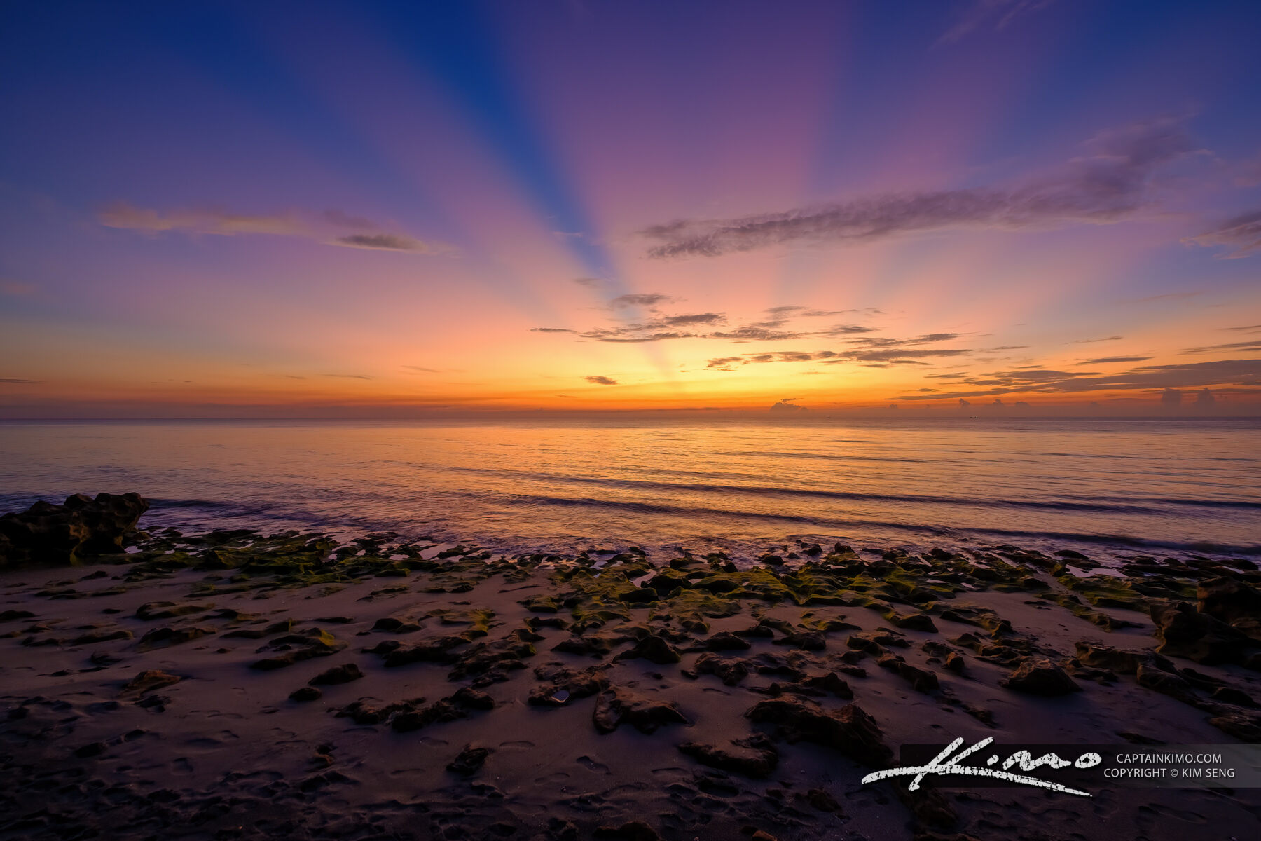 Sunrays at Beach Coral Cove Park Sunrise