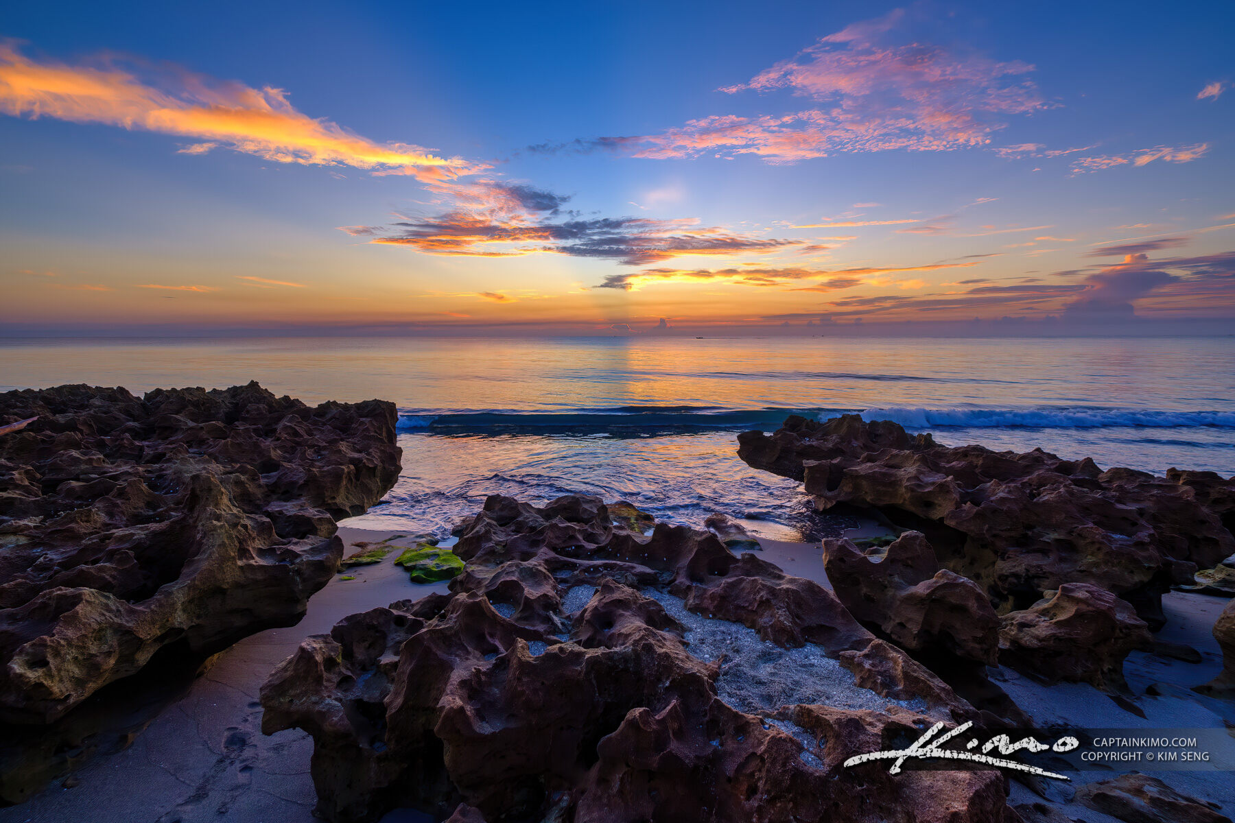 Small Wave at Beach Coral Cove Park Sunrise