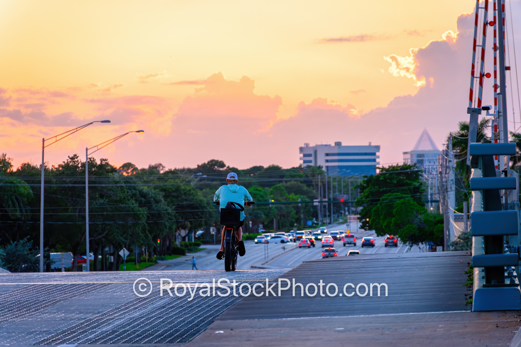 Sunset Bicycle Rider on PGA Drawbridge