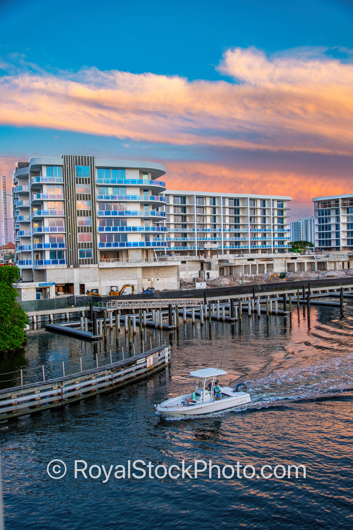 The Ritz Carlton Residences Under Constrcution with a Boat Going