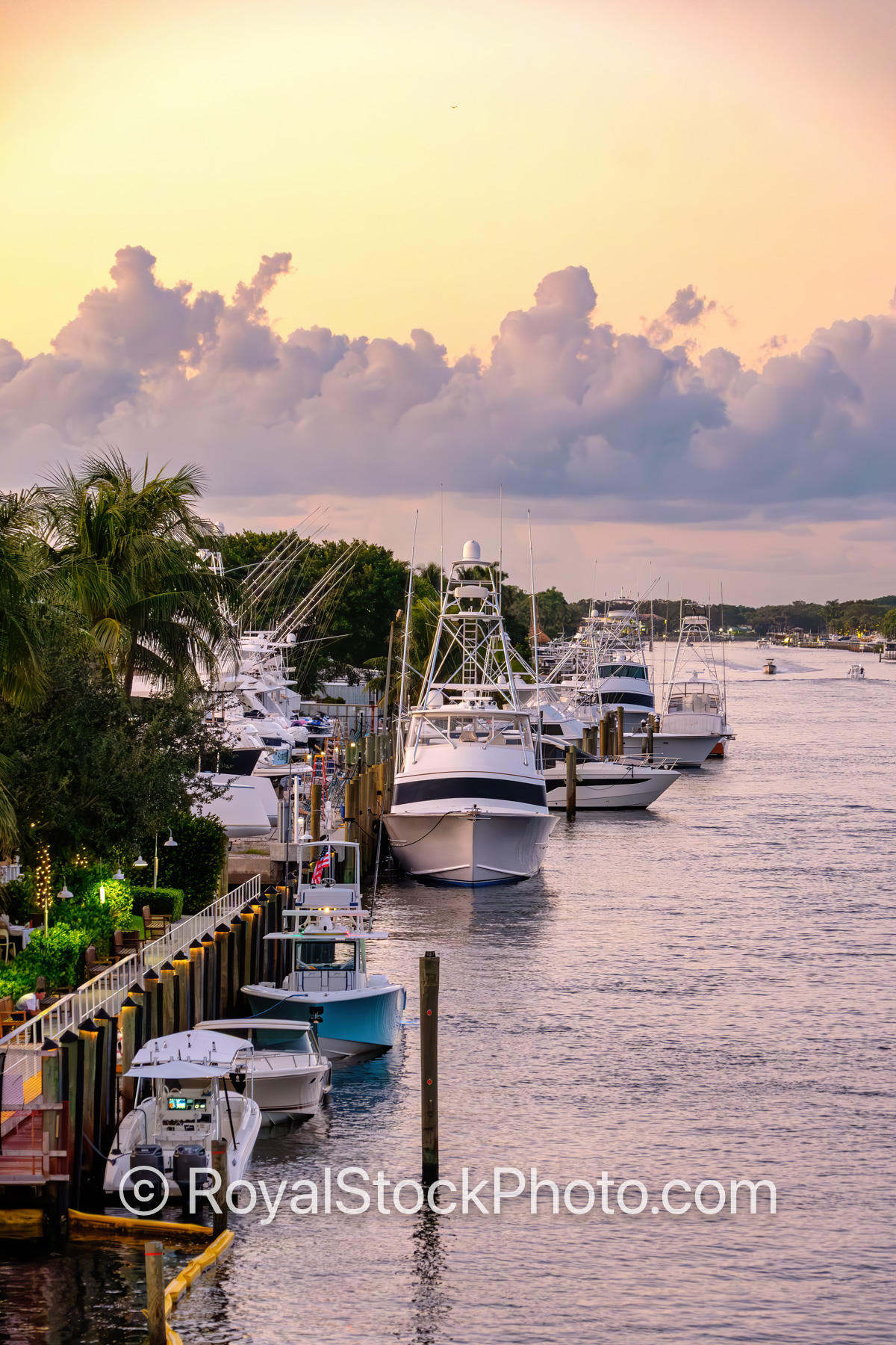 Boat Docked at the Sunset Along Waterway in Palm Beach Gardens