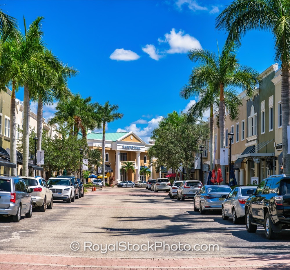 Palm TreeLined Main Street with Classic Architecture Under Bright Sunshine in Lakewood Ranch Florida