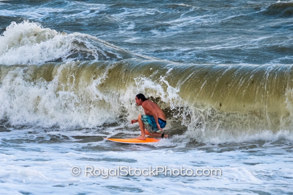 Surfer riding a wave at Juno Beach near US Highway 1 Juno Beach Florida during sunrise on US Highway 1 20251025