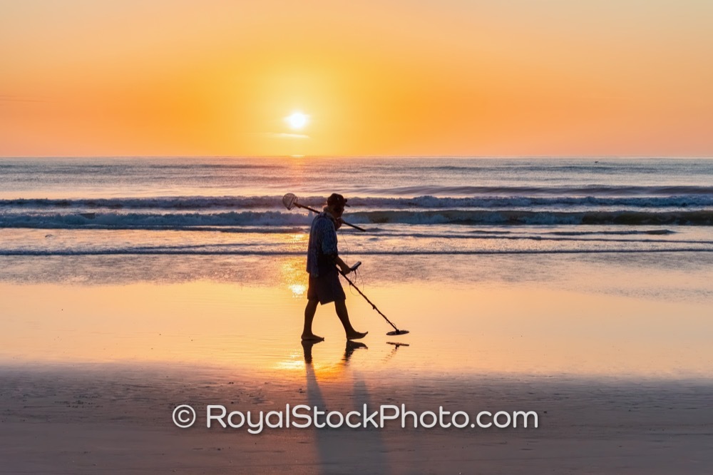 Engaging Morning Search for Treasures on Daytona Beach Main Street Pier at Sunrise 20250719