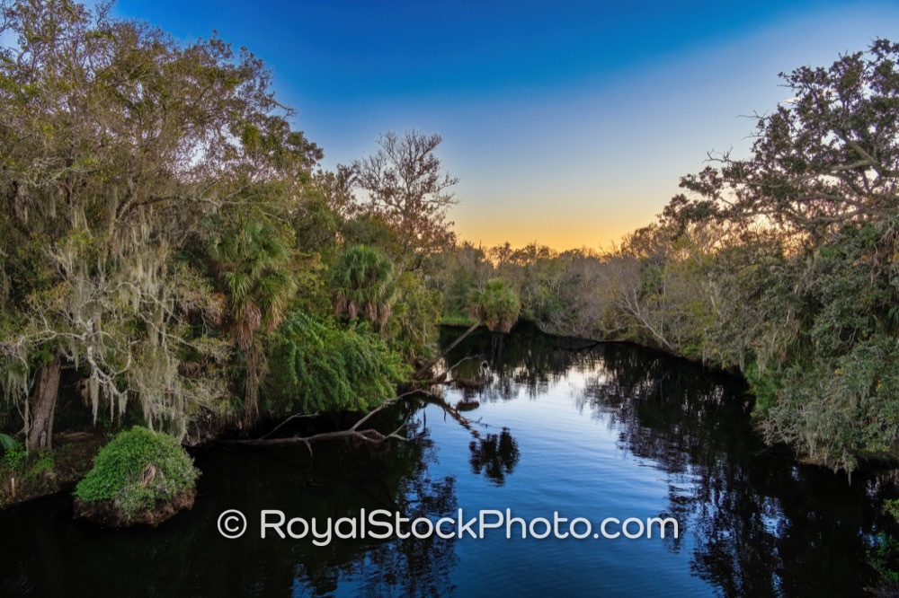Vibrant Sunset Reflections Over Canoe Launch at Turkey Creek in Palm Bay Florida on Briar Creek Boulevard 20251122
