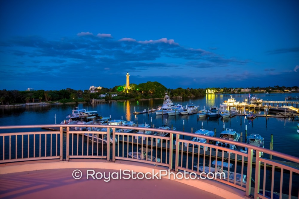 Showcase the Iconic Jupiter Inlet Lighthouse with Vibrant Marina Views at Dusk on US 1 20251224