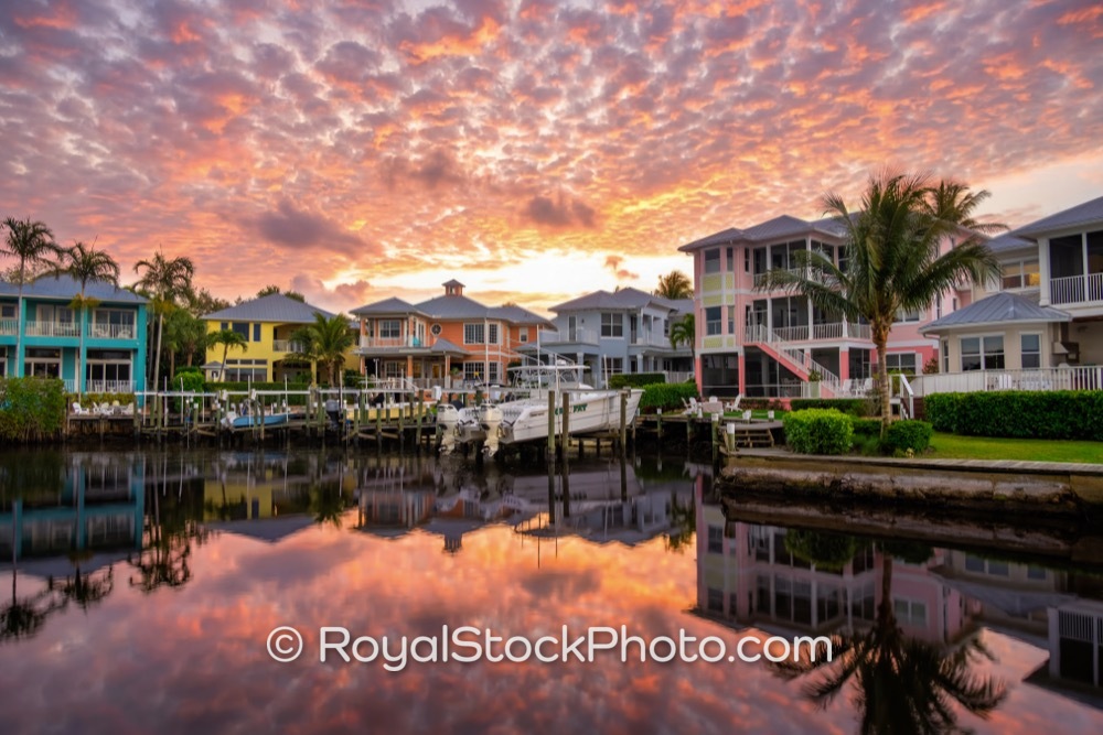 Captivating Sunset Over Vibrantly Colored Homes Reflects on Stuarts Calm Water on Southwest Saint Lucie Crescent 20260304